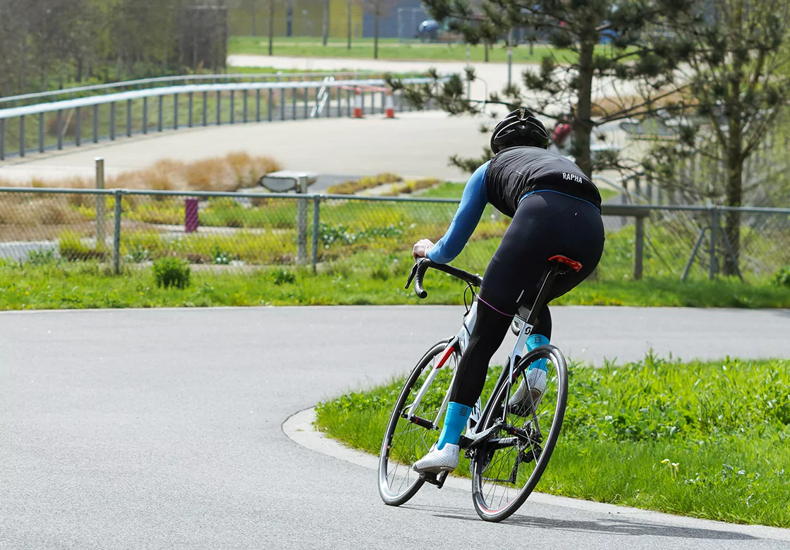 Woman cycling on a street