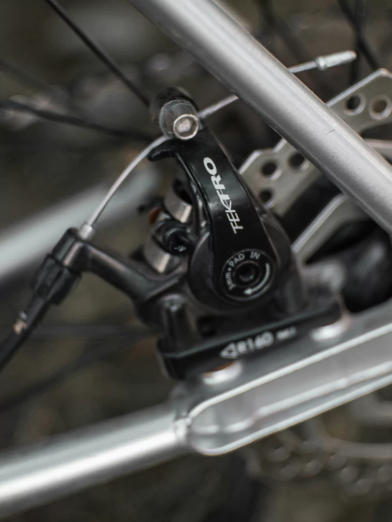 Close-up view of a bike brake, showcasing its components